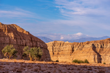 Landscape of desert sand and hills in the Mecca Wilderness in Southern California