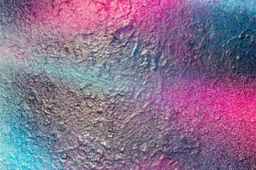 Beautiful bright colorful street art graffiti background. Abstract creative spray drawing fashion colors on the walls of the city. Urban Culture, black ,blue, purple , violet , neon texture