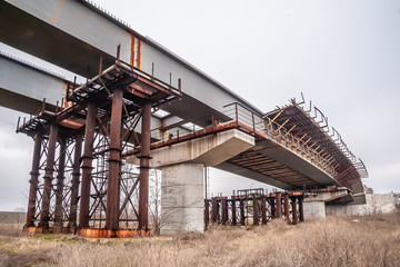 Powerful pylons support bridge spans.