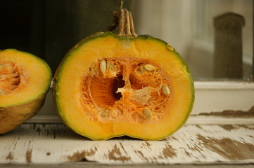 pumpkin in the countryside. yellow autumn pumpkin on an old wooden window