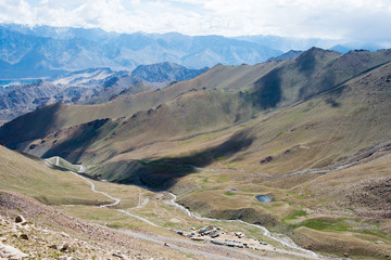 Ladakh, India - Aug 03 2019 - Beautiful scenic view from Between Khardung La Pass (5359m) and Leh in Ladakh, Jammu and Kashmir, India.