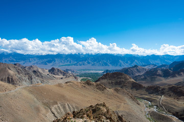Ladakh, India - Aug 03 2019 - Riders on Between Khardung La Pass (5359m) and Leh in Ladakh, Jammu and Kashmir, India.