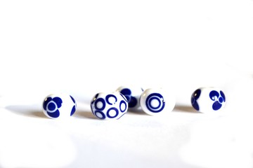 Beautiful original handmade blue and white lampwork beads. Glass jewelry  or decoration with flowers and dots. Similar look as a porcelain.