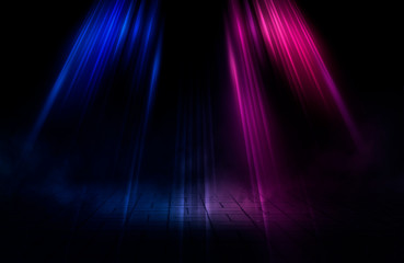 Empty background scene. Dark street, reflection of blue and pink neon light on wet pavement. Neon shapes. Rays of light in the dark, smoke. Abstract dark background.