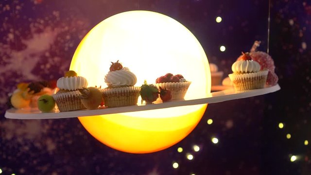 Pies spin as if on the ring of Saturn.