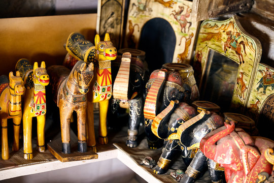 Wooden souvenirs at market in India