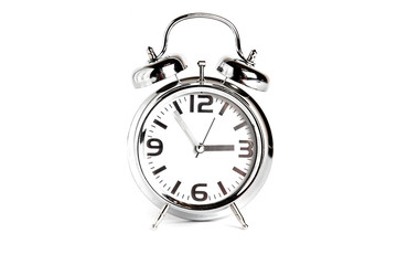 Metal Alarm clock  on white background , isolated 