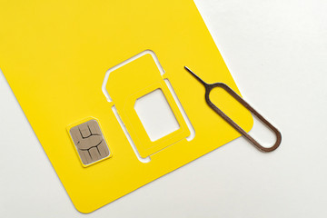new sim card isolated on color surface, contract provider chip
