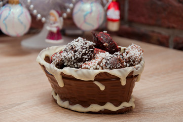 candy shop. festive sprinkle and topping. vintage retro chocolate. sweets at christmas tree. happy new year. xmas gift. handmade confection. Homemade candy in chocolate basket. sweet souvenir present