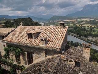 Fototapeta na wymiar Views from the bell tower of the Parish Church of Santa María de Aínsa in the Pyrenees. Province of Huesca Aragon. Spain