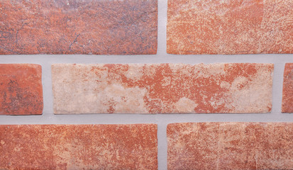 Background texture image of wall decoration tiles with rough surface and diversity of colors. Modern stone brick wall background. Stone texture. 