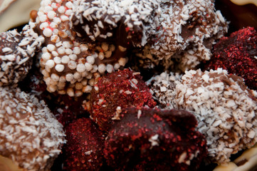 chocolate workshop. homemade chocolate. Homemade candy in chocolate basket. chocolate art background. sweet life. holiday celebration. candy shop. sprinkles and topping. cook at home