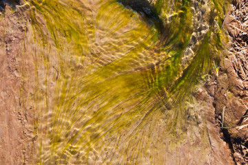  Water coming from Strokkur forming abstract patterns. Geysir sometimes known as The Great Geysir, is a geyser in southwestern Iceland. 