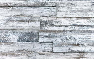 Old boards with white paint. Background and texture of aged wood.