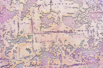Venetian plaster lilac with yellow spots. Background and texture of decorative plaster.