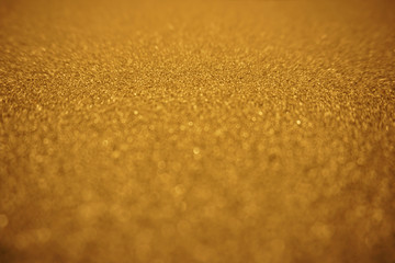 Fototapeta na wymiar Gold abstract bokeh background with texture
