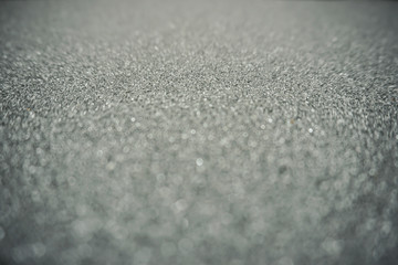 Silver abstract bokeh background with texture