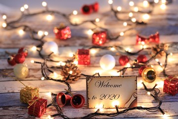 Greeting card for new year or christmas with Christmas lights and decorations