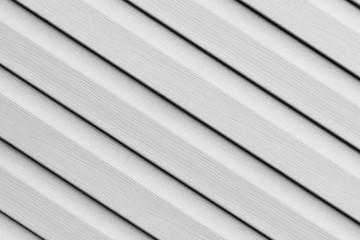 Fototapeta premium Black and white digonal stripes with texture of wooden sliding background