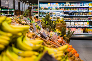 Fruit stand in a supermarket, Fruits in Supermarket, Cooling shelf in the background