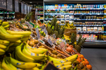 Fruit stand in a supermarket, Fruits in Supermarket, Cooling shelf in the background