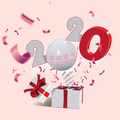 Happy New Year 2020,surprising box with a numbers and red confetti jumping out like a jack in the box isolated on the light background