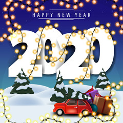 2020, happy New Year, white volumetric numbers wrapped with garland , winter landscape on background and red vintage car carrying Christmas tree