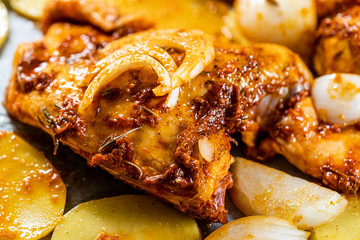 Baked Chicken Legs with Onion and Potatoes