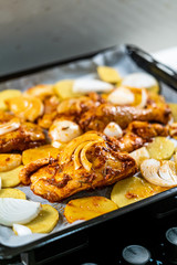 Baked Chicken Legs with Onion and Potatoes