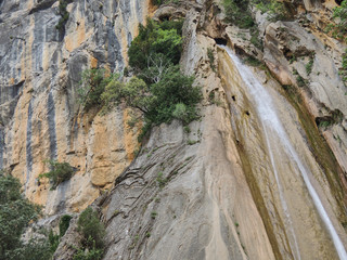 The waterfall of Linarejos in the Cerrada de Utrero. Natural Park of the Sierra de Cazorla, Segura and Las Villas. In Jaén, Andalusia. Spain