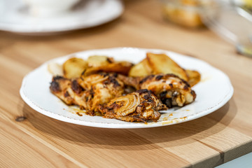 Baked Chicken Legs with Onion and Potatoes