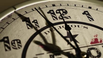 Wall clock shows five minutes to midnight on Christmas Eve or New Year, time-lapse effect. It is twelve o'clock, holiday happy new year festive and Christmas - Powered by Adobe