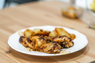 Baked Chicken Legs with Onion and Potatoes