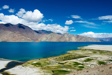 Naklejka na ściany i meble Ladakh, India - Aug 06 2019 - Pangong Lake view from Merak Village in Ladakh, Jammu and Kashmir, India. The Lake is an endorheic lake in the Himalayas situated at a height of about 4350m.