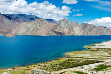 Fototapeta premium Ladakh, India - Aug 06 2019 - Pangong Lake view from Merak Village in Ladakh, Jammu and Kashmir, India. The Lake is an endorheic lake in the Himalayas situated at a height of about 4350m.