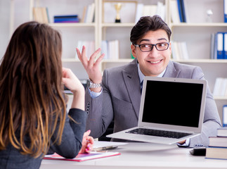 Business meeting between businessman and businesswoman