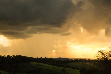 Landscape with rising thunderstorm.
