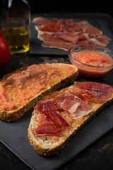 toast with ham oil and tomato