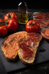 toast with ham oil and tomato