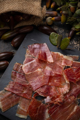 Acorn ham concept. pork product fed with oak acorns, also known in spain as black legged ham