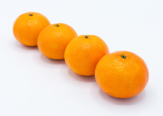 Close up of tangerines isolated on a white background