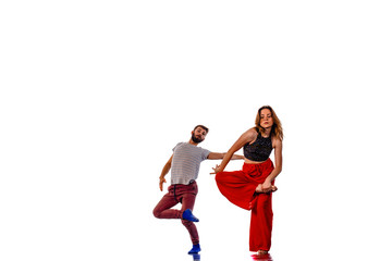 Fototapeta na wymiar Teenager dancing while doing handstand
