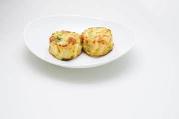 broccoli pie on a plate in the foreground. Typical Italian cuisine