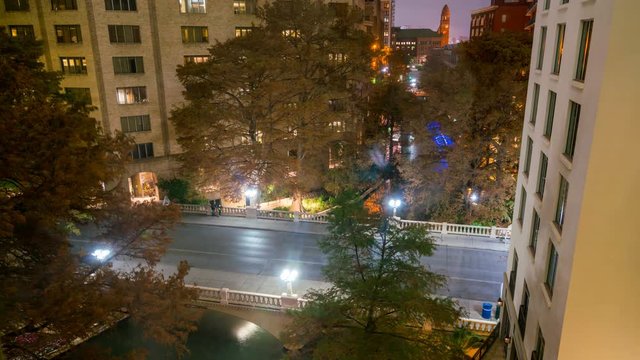 Night Time Lapse Of Bridge Over the San Antonio River Walk With Holidays Lights on the Trees