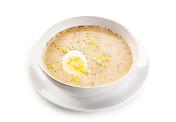  Sour rye soup on white background
