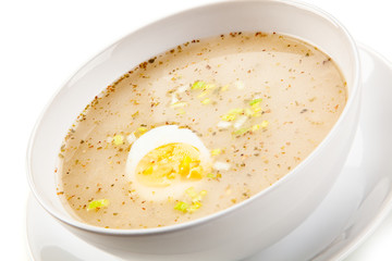  Sour rye soup on white background