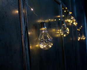 glowing lamp on black background