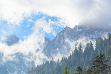View with clouds over mountains in Dolomite