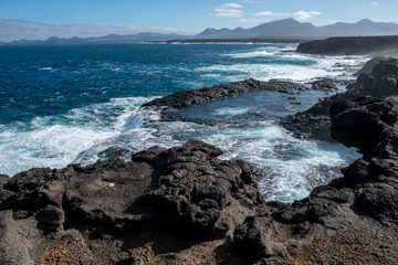 Fototapeta na wymiar landscape of lanzarote vulcanic shore with clifs