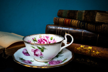 A cup of tea and old books. Cosiness